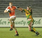24 March 2010; Tony Donnelly, Armagh, in action against Danny Curran, Donegal. Cadbury Ulster GAA Football Under 21 Quarter-Final, Armagh v Donegal, Brewster Park, Enniskillen, Co. Fermanagh. Picture credit: Oliver McVeigh / SPORTSFILE