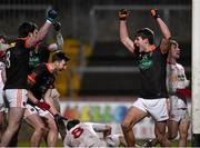 26 March 2016; Niall Grimley, right, Armagh, celebrates with team-mates after scoring his side's first goal in the final moments of the game to level the scores. Allianz Football League, Division 2, Round 6, Tyrone v Armagh, Healy Park, Omagh, Co. Tyrone. Photo by Sportsfile