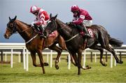 27 March 2016; Eventual winner Acapella Bourgeois, left, with Jonathan Burke up, races alongside Nambour, with Bryan Cooper up, on their way to winning the Agnelli Motor Park Novice Hurdle. Horse Racing at the Fairyhouse Easter Festival. Fairyhouse, Co. Meath. Picture credit: Cody Glenn / SPORTSFILE