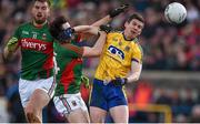 27 March 2016; Sean Purcell, Roscommon, in action against Aidan O'Shea, left, and Jason Doherty, Mayo. Allianz Football League Division 1 Round 6, Roscommon v Mayo. Dr Hyde Park, Roscommon.  Picture credit: Brendan Moran / SPORTSFILE