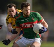 27 March 2016; Chris Barrett, Mayo, in action against Niall Kilroy, Roscommon. Allianz Football League Division 1 Round 6, Roscommon v Mayo. Dr Hyde Park, Roscommon.  Picture credit: Brendan Moran / SPORTSFILE