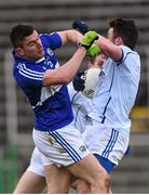 27 March 2016; Conor Moynagh, Cavan, is tackled by Colm Begley, Laois. Allianz Football League Division 2 Round 6, Cavan v Laois. Kingspan Breffni Park, Cavan.  Picture credit: Ramsey Cardy / SPORTSFILE
