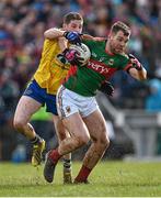 27 March 2016; Seamus O'Shea, Mayo, in action against Fintan Cregg, Roscommon. Allianz Football League Division 1 Round 6, Roscommon v Mayo. Dr Hyde Park, Roscommon.  Picture credit: Brendan Moran / SPORTSFILE
