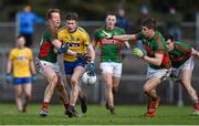 27 March 2016; Cathal Cregg, Roscommon, is dispossessed by Donal Vaughan, left, Mayo. Allianz Football League Division 1 Round 6, Roscommon v Mayo. Dr Hyde Park, Roscommon.  Picture credit: Brendan Moran / SPORTSFILE