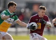 27 March 2016; Shane Dempsey, Westmeath, in action against Sean Pendar, Offaly. Allianz Football League Division 3 Round 6, Westmeath v Offaly. TEG Cusack Park, Mullingar, Co. Westmeath. Picture credit: Seb Daly / SPORTSFILE