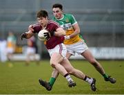 27 March 2016; Callum McCormack, Westmeath, in action against Eoin Rigney, Offaly. Allianz Football League Division 3 Round 6, Westmeath v Offaly. TEG Cusack Park, Mullingar, Co. Westmeath. Picture credit: Seb Daly / SPORTSFILE