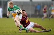 27 March 2016; Niall Darby, Offaly, in action against Denis Corroon, Westmeath. Allianz Football League Division 3 Round 6, Westmeath v Offaly. TEG Cusack Park, Mullingar, Co. Westmeath. Picture credit: Seb Daly / SPORTSFILE