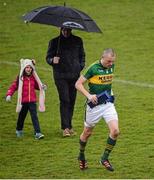 27 March 2016; TG4 Man of the Match recipient Kieran Donaghy makes his way back to the dressing room during a fall of rain. Allianz Football League Division 1 Round 6, Monaghan v Kerry. St Tiernach's Park, Clones, Co. Monaghan.  Picture credit: Stephen McCarthy / SPORTSFILE