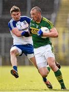 27 March 2016; Kieran Donaghy, Kerry, in action against Dessie Mone, Monaghan. Allianz Football League Division 1 Round 6, Monaghan v Kerry. St Tiernach's Park, Clones, Co. Monaghan.  Picture credit: Stephen McCarthy / SPORTSFILE