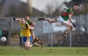 27 March 2016; Diarmuid O'Connor, Mayo, competes for possession with Fintan Cregg, Roscommon. Allianz Football League Division 1 Round 6, Roscommon v Mayo. Dr Hyde Park, Roscommon.  Picture credit: Brendan Moran / SPORTSFILE
