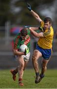 27 March 2016; Lee Keegan, Mayo, holds off the challenge of Fintan Cregg, Roscommon. Allianz Football League Division 1 Round 6, Roscommon v Mayo. Dr Hyde Park, Roscommon.  Picture credit: Brendan Moran / SPORTSFILE