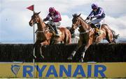 27 March 2016; Kylemore Lough, right, with Barry Geraghty up, jumps the last alongside Outlander, with Bryan Cooper up, on their way to winning the Ryanair Gold Cup Novice Steeplechase. Horse Racing at the Fairyhouse Easter Festival. Fairyhouse, Co. Meath. Picture credit: Cody Glenn / SPORTSFILE