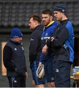 28 March 2016; Leinster's Sean O'Brien watches on during squad training, in the company of Leinster physiotherapist Karl Denvir, right. UCD, Belfield, Dublin. Picture credit: Stephen McCarthy / SPORTSFILE