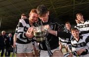 28 March 2016; Tom Whitty and team-mate Darren Mullen, left, St. Kiernan's College, Kilkenny, atempt to fix the cup after it got damaged in the celebrations following the game. Masita GAA All Ireland Post Primary Schools Croke Cup Final, Ard Scoil Ris, Limerick v St Kieran's College, Kilkenny. Semple Stadium, Thurles, Co. Tipperary. Photo by Sportsfile