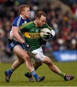 27 March 2016; Darran O'Sullivan, Kerry, in action against Colin Walshe, Monaghan. Allianz Football League Division 1 Round 6, Monaghan v Kerry. St Tiernach's Park, Clones, Co. Monaghan.  Picture credit: Stephen McCarthy / SPORTSFILE