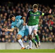 28 March 2016; Steve Davis, Northern Ireland, in action against Bojan Jokic, Slovenia. International Friendly, Northern Ireland v Slovenia. National Football Stadium, Windsor Park, Belfast. Picture credit: Oliver McVeigh / SPORTSFILE