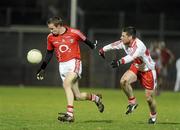 27 March 2010; John Hayes, Cork, in action against Barry McGuigan, Derry. Allianz GAA Football National League, Division 1, Round 6, Derry v Cork, Celtic Park, Derry. Picture credit: Oliver McVeigh / SPORTSFILE