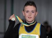 27 March 2010; Greg Barrett, Abbey Striders AC, with his medal after winning the boys U12 Long Jump during the Woodie’s DIY Juvenile Indoor Championships. Nenagh Indoor Arena, Nenagh, Co. Tipperary. Picture credit: Pat Murphy / SPORTSFILE