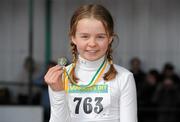 27 March 2010; Molly Scott, Hacketstown AC, with her medal after winning the Girls U12 60m at the Woodie’s DIY Juvenile Indoor Championships. Nenagh Indoor Arena, Nenagh, Co. Tipperary. Picture credit: Pat Murphy / SPORTSFILE