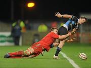 26 March 2010; Max Evans, Glasgow Warriors, is tackled by Niall Ronan, Munster. Celtic League, Munster v Glasgow Warriors. Thomond Park, Limerick. Picture credit: Stephen McCarthy / SPORTSFILE