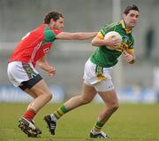 21 March 2010; Bryan Sheehan, Kerry, in action against Tom Parsons, Mayo. Allianz National Football League, Division 1, Round 5, Kerry v Mayo, Austin Stack Park, Tralee, Co. Kerry. Picture credit: Stephen McCarthy / SPORTSFILE