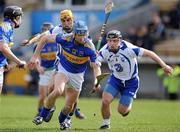 28 March 2010; John O'Brien, Tipperary, in action against Shane Fives and Noel Connors, 4, Waterford. Allianz GAA Hurling National League, Division 1, Round 5, Tipperary v Waterford, Semple Stadium, Thurles, Co. Tipperary. Picture credit: Matt Browne / SPORTSFILE