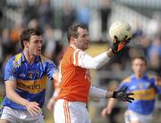 28 March 2010; Steven McDonnell, Armagh, in action against Paddy Codd, Tipperary. Allianz GAA Football National League, Division 2, Round 6, Armagh v Tipperary, St Oliver Plunkett Park, Crossmaglen, Armagh. Picture credit: Oliver McVeigh / SPORTSFILE