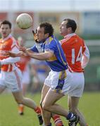 28 March 2010; Christopher Aylward, Tipperary, in action against Steven McDonnell, Armagh. Allianz GAA Football National League, Division 2, Round 6, Armagh v Tipperary, St Oliver Plunkett Park, Crossmaglen, Armagh. Picture credit: Oliver McVeigh / SPORTSFILE