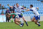 28 March 2010; Conor Mortimer, Mayo, in action against Dermot Malone and Paul Finlay, right, Monaghan. Allianz GAA Football National League, Division 1, Round 6, Mayo v Monaghan, McHale Park, Castlebar, Co. Mayo. Picture credit: Brian Lawless / SPORTSFILE