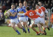 28 March 2010; Brian Coen, Tipperary, in action against Paul Kernan, Armagh. Allianz GAA Football National League, Division 2, Round 6, Armagh v Tipperary, St Oliver Plunkett Park, Crossmaglen, Armagh. Picture credit: Oliver McVeigh / SPORTSFILE