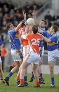 28 March 2010; Kieran Toner and Kevin Dyas, Armagh, in action against Kevin Mulryan and Hugh Coghlan, Tipperary. Allianz GAA Football National League, Division 2, Round 6, Armagh v Tipperary, St Oliver Plunkett Park, Crossmaglen, Armagh. Picture credit: Oliver McVeigh / SPORTSFILE