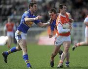 28 March 2010; Aaron Kernan, Armagh, in action against Robbie Costigan and Christopher Aylward, Tipperary. Allianz GAA Football National League, Division 2, Round 6, Armagh v Tipperary, St Oliver Plunkett Park, Crossmaglen, Armagh. Picture credit: Oliver McVeigh / SPORTSFILE