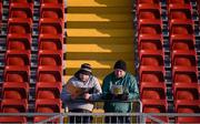 30 March 2016; Pat Ferguson, left, and Martin Rice, from Carlingford, Co. Louth, study the programmes ahead of the game. EirGrid Ulster GAA Football U21 Championship, Semi-Final, Monaghan v Armagh, Páirc Esler, Newry, Co. Down. Picture credit: David Fitzgerald / SPORTSFILE