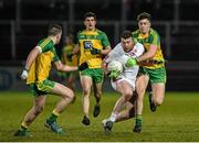 30 March 2016; Ruairi McGlone, Tyrone, in action against Eamon McGrath and Ciaran Gillespie, right, Donegal. EirGrid Ulster GAA Football U21 Championship, Semi-Final, Tyrone v Donegal, Celtic Park, Derry. Picture credit: Oliver McVeigh / SPORTSFILE