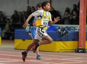 27 March 2010; Simon Essuman, Dublin Striders AC, crosses the finish line to win the Boys U13 60m final at the Woodie’s DIY Juvenile Indoor Championships. Nenagh Indoor Arena, Nenagh, Co. Tipperary. Picture credit: Pat Murphy / SPORTSFILE