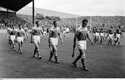 5 September 1965; The Wexford and Tipperary teams during the parade ahead of the game. All Ireland Senior Hurling Championship Final, Tipperary v Wexford, Croke Park, Dublin. Picture credit; Connolly Collection / SPORTSFILE