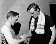 1966; A boxer has his strapping undone after his bout. Boxing, National Boxing Stadium, South Circular Road, Dublin. Picture credit: Connolly Collection / SPORTSFILE