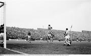 26 April 1964; Paddy Ambrose, Shamrock Rovers, in action against goalkeeper Kevin Blount, Cork Celtic. FAI Cup Final, Shamrock Rovers v Cork Celtic, Dalymount Park, Dublin. Picture credit; Connolly Collection / SPORTSFILE