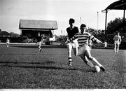 1964; Noel Dunne, Shamrock Rovers, in action against Jimmy Kinsella, Drogheda United. FAI Shield, Shamrock Rovers v Drogheda United, Glenmalure Park, Milltown, Dublin. Picture credit; Connolly Collection / SPORTSFILE