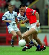 13 May 2001; Sean Og O'Hailpin of Cork in action against Connie Power of Waterford during the Bank of Ireland Munster Senior Football Championship Quarter-Final match between Cork and Waterford at Páirc Uí Chaoimh in Cork. Photo by Ray McManus/Sportsfile