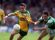 19 May 2001; Brendan Devenney of Donegal in action against Ryan McCloskey of Fermanagh during the Ulster Minor Football Championship Quarter-Final match between Donegal and Fermanagh at MacCumhaill Park in Ballybofey, Donegal. Photo by Damien Eagers/Sportsfile