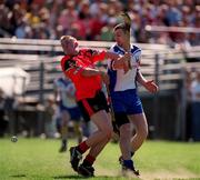 13 May 2001; Jerome Trainor of Down is tackled by Vinnie Norton of New York during the Ulster Senior Hurling Championship Quarter-Final match between New York and Down at Gaelic Park in New York City, USA. Photo by Aoife Rice/Sportsfile