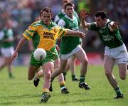 19 May 2001; James Gallagher of Donegal in action against Raymond Johnston of Fermanagh during the Ulster Minor Football Championship Quarter-Final match between Donegal and Fermanagh at MacCumhaill Park in Ballybofey, Donegal. Photo by Damien Eagers/Sportsfile