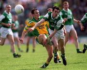 19 May 2001; James Gallagher of Donegal in action against Raymond Johnston of Fermanagh during the Ulster Minor Football Championship Quarter-Final match between Donegal and Fermanagh at MacCumhaill Park in Ballybofey, Donegal. Photo by Damien Eagers/Sportsfile