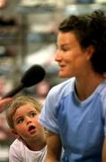 15 May 2001; Karmele Kibor, aged 3 1/2, from Clondalkin, Dublin, watches in awe as top Irish Athlete Sonia O'Sullivan is interviewed in Dublin with NIKE to offer tips and advice to Women's Mini-Marathon Meet and Train leaders from around the country. Photo by Brendan Moran/Sportsfile