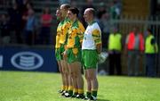 19 May 2001; Donegal defence, from left, Patrick Campbell, Eamon Doherty, Shane Carr and goalkeeper Tony Blake stand for the national anthem ahead of the Bank of Ireland Ulster Senior Football Championship Preliminary Round Replay match between Fermanagh and Donegal at Brewster Park in Enniskillen, Fermanagh. Photo by Damien Eagers/Sportsfile