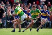 13 May 2001; John Crowley of Kerry in action against Sean Collum of Tipperary during the Bank of Ireland Munster Senior Football Championship Quarter-Final match between Tipperary and Kerry at Clonmel Sportsfield in Clonmel, Tipperary. Photo by Brendan Moran/Sportsfile