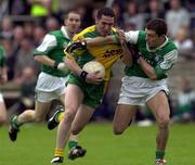 19 May 2001; Brendan Devenney of Donegal in action against Ryan McCloskey of Fermanagh during the Bank of Ireland Ulster Senior Football Championship Preliminary Round Replay match between Fermanagh and Donegal at Brewster Park in Enniskillen, Fermanagh. Photo by Damien Eagers/Sportsfile