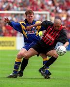 13 May 2001; Alex Nesovic of Bohemians in action against Eric Smith of Longford Town during the Harp Lager FAI Cup Final match between Bohemians and Longford Town at Tolka Park in Dublin. Photo by Ray Lohan/Sportsfile