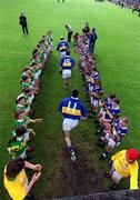 13 May 2001; Tipperary captain Liam Cronin, 7, leads his team out ahead of the Bank of Ireland Munster Senior Football Championship Quarter-Final match between Tipperary and Kerry at Clonmel Sportsfield in Clonmel, Tipperary. Photo by Brendan Moran/Sportsfile